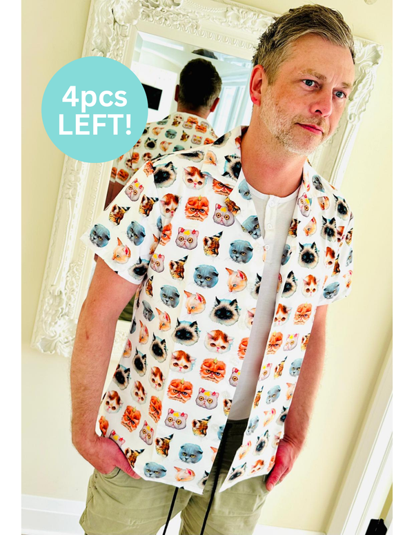 a shirt with cat face patterns