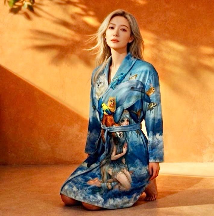 Comfortable Soft fleece blue bathrobe decorated with vibrant fantasy artwork of animals and a dreamy character